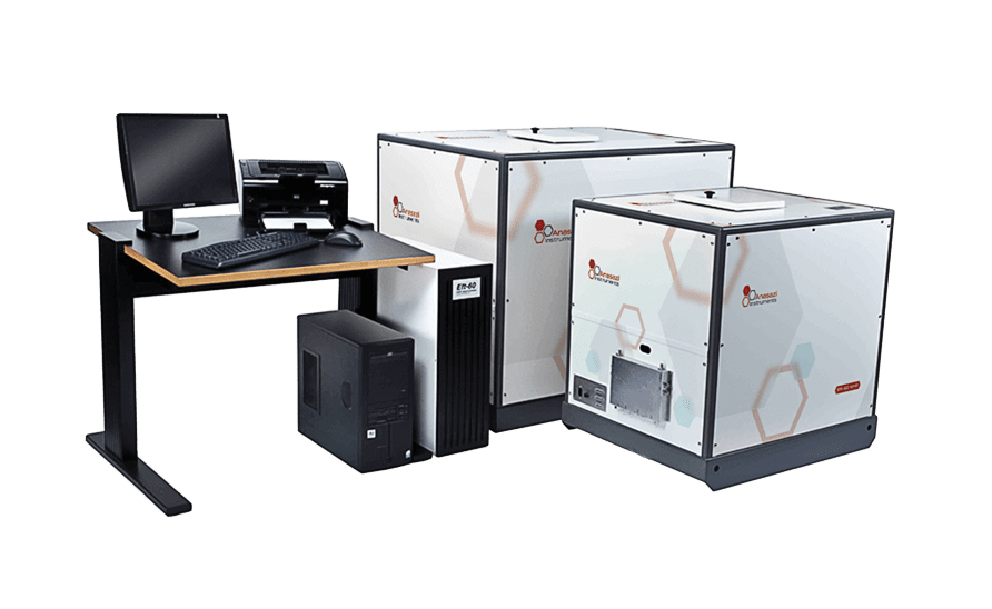 Anasazi Instruments 90 MHz and 60 MHz NMR spectrometers near desk with computer equipment